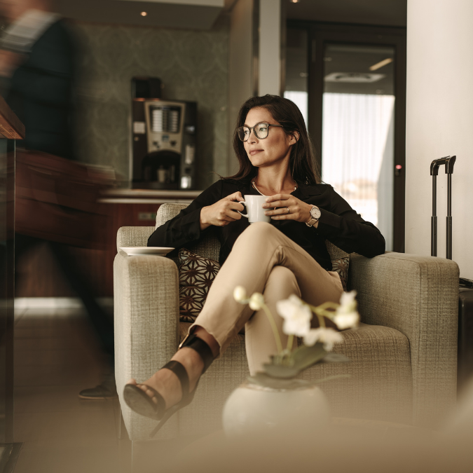 an Airport Butler customer relaxing in one of our Wingtips Lounges.